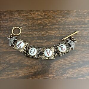 Lucky Brand Antiqued Gold-Tone LOVE Bracelet with White Enamel